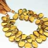 Natural Beer Quartz Smooth Hand Polished Pear Drop Briolette Beads Strand Rondelles Sold per 6 beads & Sizes from 14mm to 16.5mm approx.Beer Quartz is a beautiful variety of yellow quartz. Its beer like shade differentiates it from citrine or lemon quartz. 